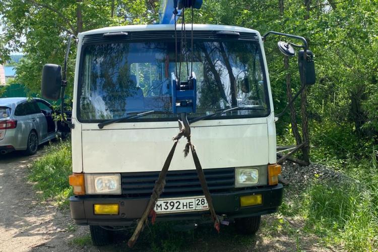 Эвакуатор Mitsubishi Fuso Fighter в городе Благовещенск с лебёдкой и  манипулятором