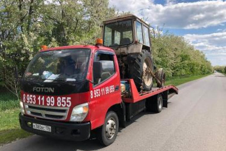 Эвакуатор Foton в село Лосево с ломаной платформой, подкатными и лебедкой